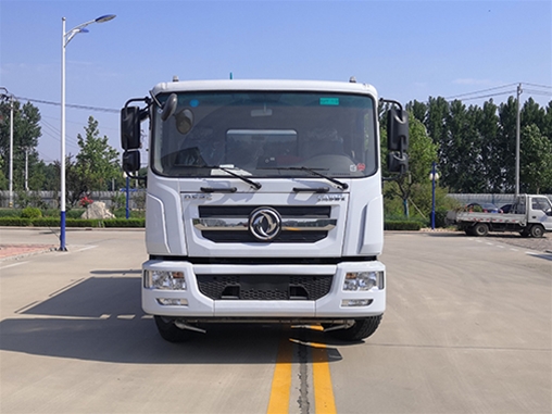 Dust suppression vehicle